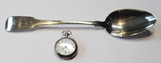 Irish silver fiddle pattern tablespoon with rat tail, Dublin 1844, and a silver fob watch.  (2)