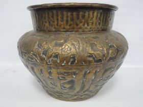 Persian or north Indian brass jardinière, c. late 19th century, embossed with trailing animals in