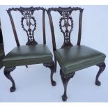 Pair of mahogany dining chairs in the George III style, c. 1900, by S & H Jewell, Holborn, with