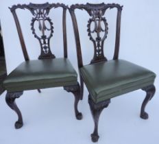Pair of mahogany dining chairs in the George III style, c. 1900, by S & H Jewell, Holborn, with