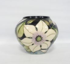 Moorcroft 'Sophie' pattern oviform vase designed by Sian Leeper with tube lined decorated on blue