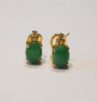 Pair of jadeite ear clips, oval cabochons and tiny diamonds, in gold, '18k', 7.5g gross.