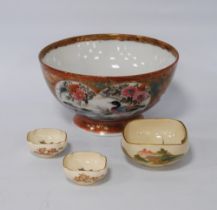 Japanese Kutani bowl in typical colours, decorated with panels of birds and floral sprays to the