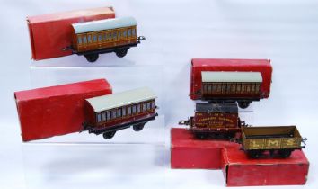 Five Hornby by Meccano O gauge coaches and wagons comprising two French Voiture no. 1 coaches, 3113,