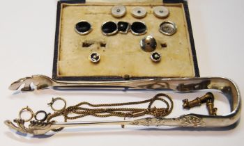 Various dress studs and buttons, '9' and '18ct', silver tongs and various items.