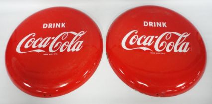 Pair of Coca-Cola vintage enamel button signs, c. mid-20th century, 'Drink Coca-Cola', trade mark