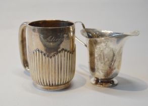 Silver fluted christening mug, Birmingham 1903, and a small silver jug, 1927, 174g.