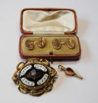 Pair of 9ct gold cufflinks (2.6g), a gold gem-set watch key and a mourning brooch.