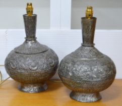 Pair of Persian white metal baluster vase lamps, c. late 19th/early 20th century, embossed with
