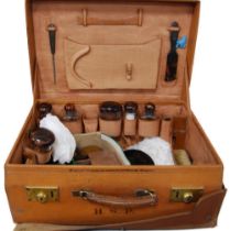 George V period part silver-mounted and simulated tortoiseshell travel set, hallmarks for London