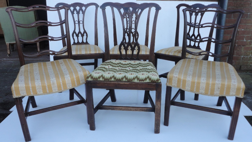 Set of four Georgian mahogany dining chairs with pierced splats, fabric-covered slip-in seats, on