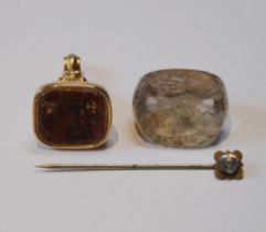 Georgian gold-filled seal with a foiled crest, a crested quartz seal swivel and a scarf pin.