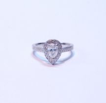 Diamond pear-shaped cluster ring with brilliant, the border and shoulders set with tiny