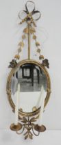 Gilt metal girandole wall mirror in the 18th century style, with a floral and ribbon surmount and