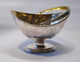 Silver sugar basket, oval, with chased panels, 1786, 15cm, 244g or 7½oz.