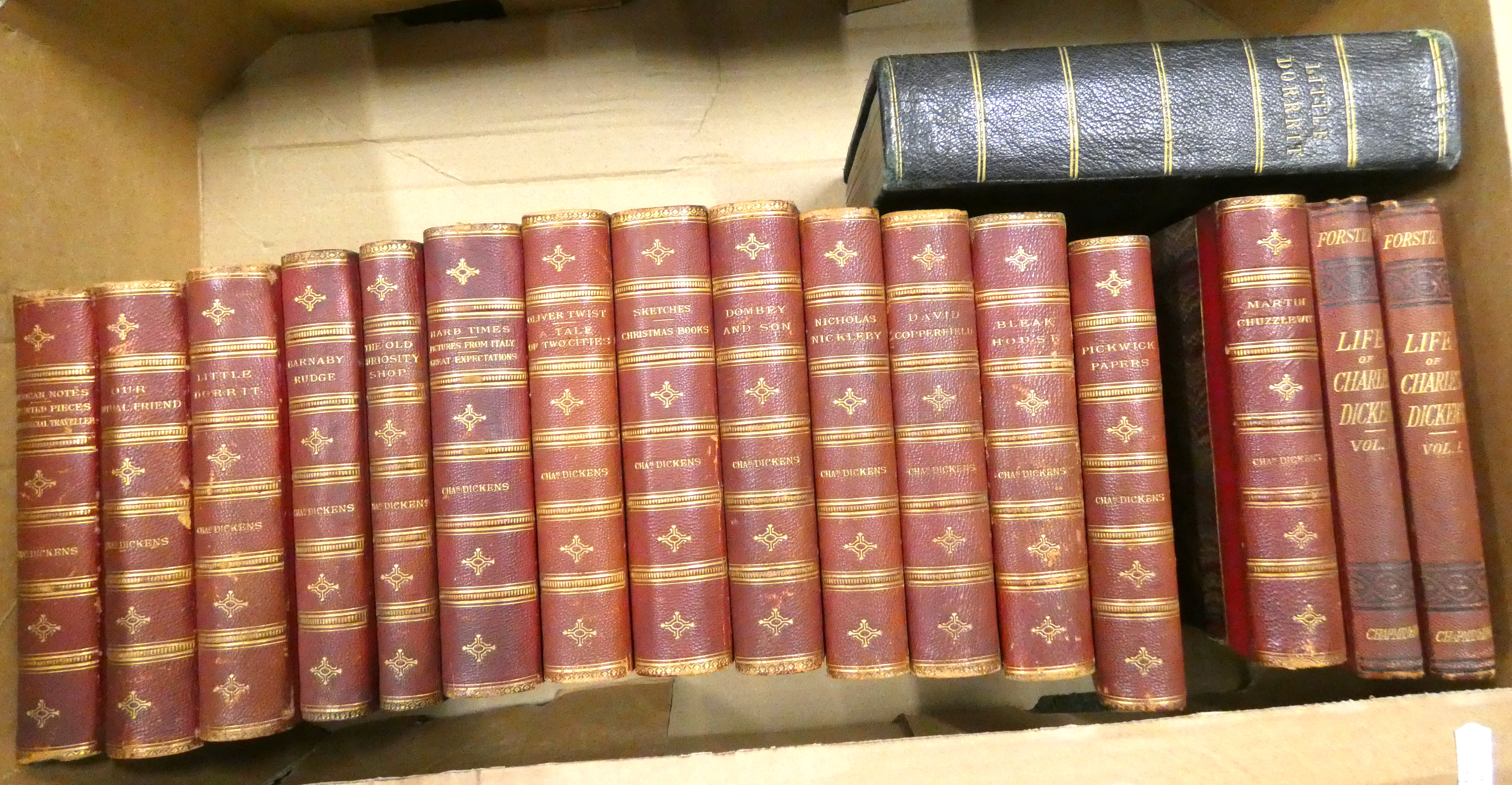 DICKENS CHARLES.  Works. 14 various uniform vols. Illus. Half red morocco, marbled brds. Chapman &