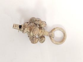 Victorian silver child's rattle, with whistle, bells and ring, apparently unmarked. 1860.