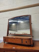 Georgian satinwood dressing mirror, the swing mirror on shaped table base with fitted drawers and