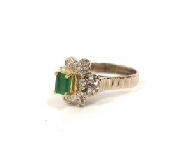 Diamond and emerald high cluster ring in 18ct gold 1973. 4g