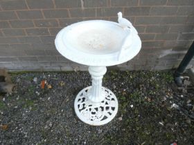 Antique cast iron white painted bird bath, dished circular bowl decorated with two doves on reeded