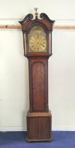 Thirty hour long case clock by Thos. Wallace, Brampton, 12" engraved brass dial with false winding