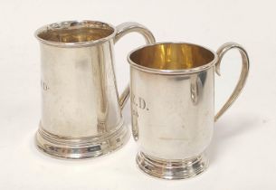 Silver christening mug of early Georgian tapering shape, initialled and another, ovoid. 196g.