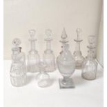 Group of Georgian and later glass decanters to include pair of dimple cut decanters, one example