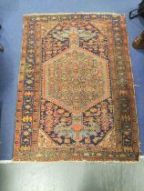 North West Persian hand knotted rug, with large medallion to the centre and allover geometric