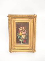 Early 20th Century School. Still life of mixed flowers in a vase. Oil on board. Initialled WP,