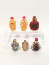 Group of six Chinese glass snuff bottles, to include Cloisonne and overlaid examples, and a pair