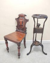 Victorian mahogany hall chair with shaped scroll back bearing scroll cartouche to the centre on