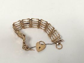 9ct gold gate bracelet with padlock snap. 1970, 16.4g