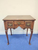 George III walnut lowboy with small centre drawer flanked by deep drawers, on cabriole supports