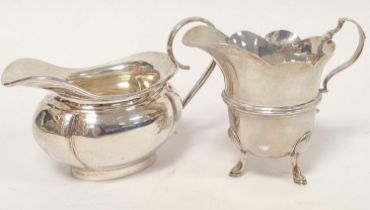 Silver cream jug of Georgian style and another, ovoid. 146g.  4.5oz. (2)