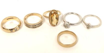 Two diamond rings in white gold, another with citrine, and three others, all 9ct. 16g gross