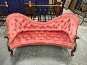 Victorian mahogany scroll end sofa, upholstered in later pink button back velour, with scroll arm