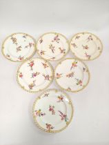 Set of six late 18th century porcelain plates in the Chelsea Derby style, each with gilt feathered &