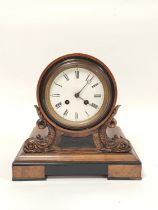 Late 19th century French drumhead figured walnut mantel clock the clock raised on repousse