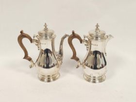 Pair of silver café au lait pots of Georgian baluster shape by Hamilton & Inches, Edinburgh 1966,