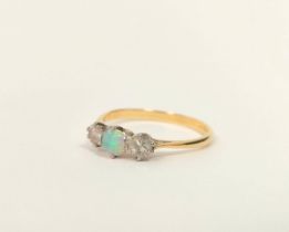 Diamond and opal three stone ring, 16g. '18ct platinum 1930's, size 'R'.