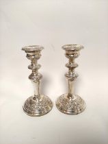 Pair of silver table candlesticks with knopped stems and embossed bands. 19cm. Mid 20th century.