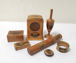 Group of Mauchline wares to include coin bank with clock face, scroll holder, napkin ring, box