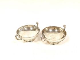 Two silver, two handled, shallow bowls by Huttons, Birmingham 1906. 220g. 7oz.