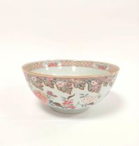 Chinese export 18th century porcelain bowl painted in floral and scroll enamels on circular foot,