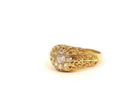 Diamond ring in pierced and champlevé, 18ct gold, dated 1909. 5.3g. Size 'N'