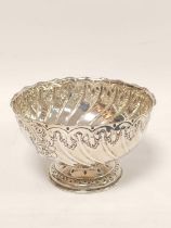 Silver vase bowl, hemispherical with embossed spiral flutes and bands, by Harry Atkin, Sheffield.