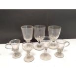 Group of antique glassware to include three rummers, two examples with dimple decoration, custard