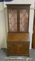 George III style composite bureau bookcase the bookcase top with geometric frieze above two astragal