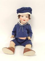 German bisque porcelain headed doll by Heubach & Koppelsdorf circa 1890, modelled as a sailor boy