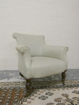 Victorian mahogany salon chair upholstered in later fabric on turned supports with brass caps and